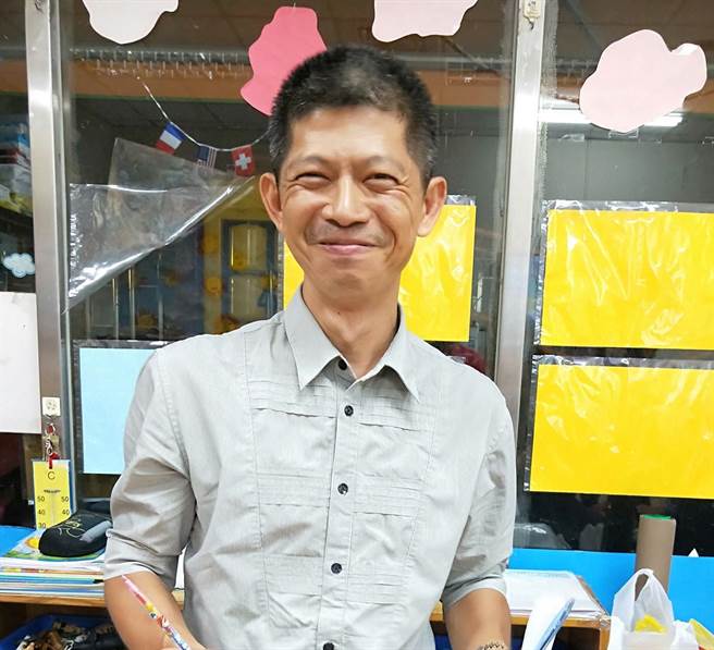 陳菊隨行攝影官吳建鴻。（圖／取自臉書）