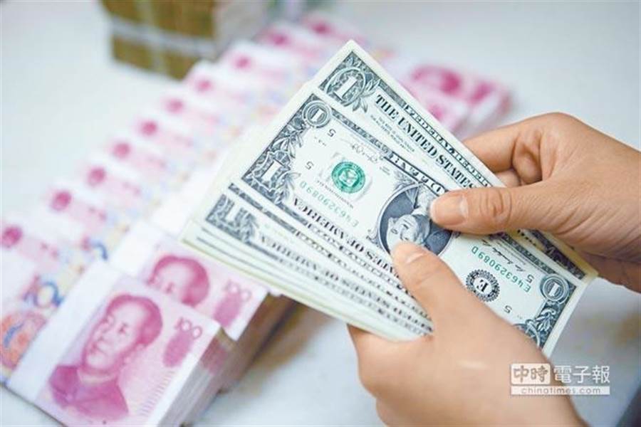陸美戰火從貿易戰延燒到貨幣戰。(中新社資料照片)