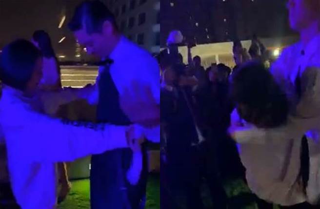 小S上前帮脱AKIRA衣服，被扣入怀理制止。(图／翻摄自脸书)