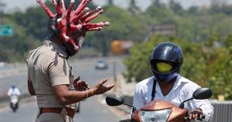 嚇阻民眾外出　印度警與藝術家製作「新冠病毒頭盔」