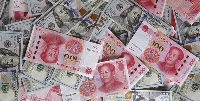 人民币影响力正赶上美元。中新社资料照片