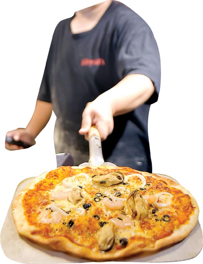 開在華山文創園區內的〈Alleycat's〉概念店有磚砌窯烤爐，Pizza都是客人現點、廚師現做。圖／姚舜