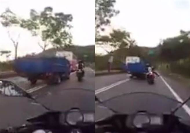 骑士摔地后立刻向外车道闪避，有惊无险逃死。（图／翻摄自重机车友各区路况、天气回报中心）