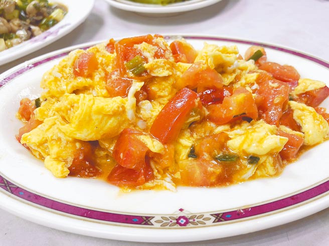 「番茄炒蛋」看似简单，却烧得茄软蛋香。（梁幼祥提供）