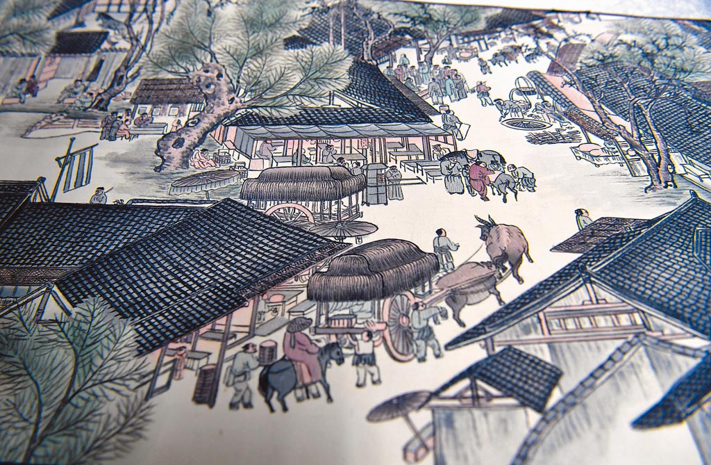 《清明上河圖》特寫中可看出畫中的長桌凳。（新華社資料照片）