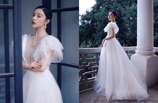 阚清子穿上一套纯白色蝴蝶袖深V裙登场，低胸的领口设计尺度十分惹火。（图／摘自微博@阚清子）