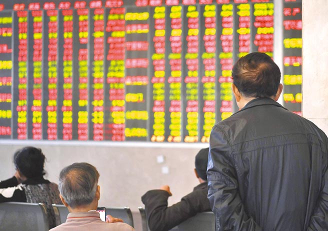 大陆私募机构看好A股表现，逾9成决定抱股过年。（中新社资料照片）