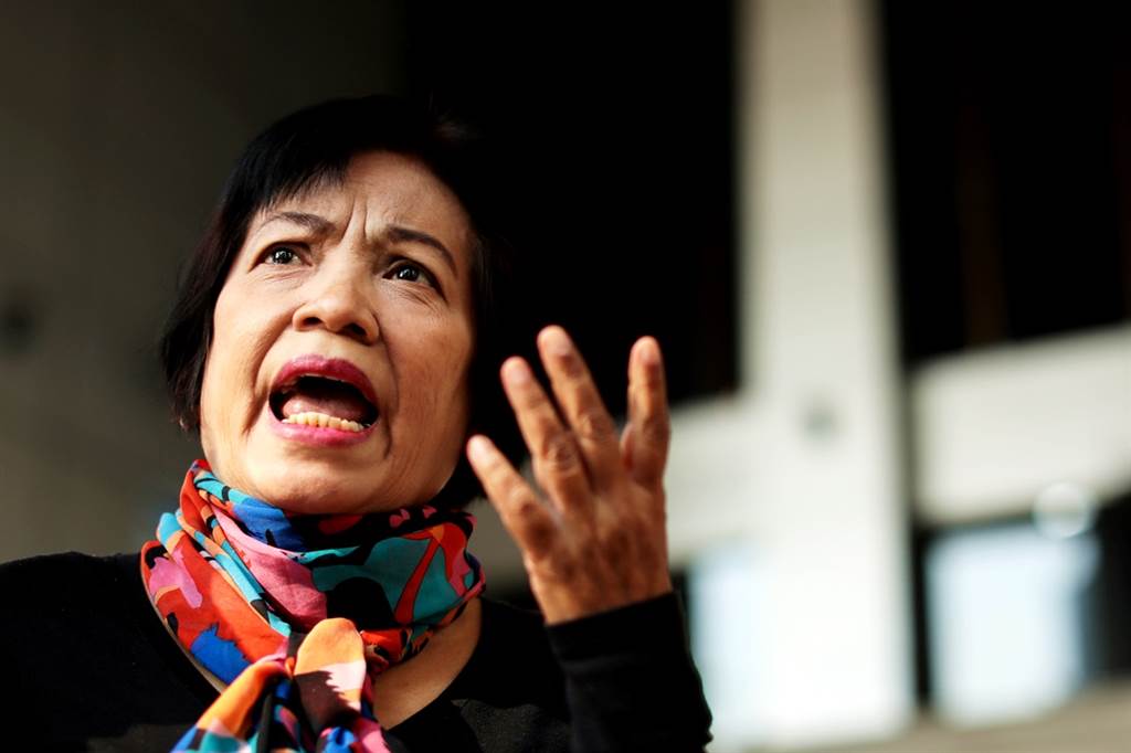 65岁泰国女子安昌因在网路上分享含有辱骂泰国王室内容的影片，19日遭泰国法院判刑43年，是泰国史上因为侮辱王室而实施的最严厉惩罚。（图／路透社）(photo:ChinaTimes)