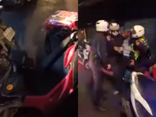 女子一怒之下把他的外送机车踢倒，最后警方到现场压制住2人。（图／翻摄自脸书「爆料公社」）