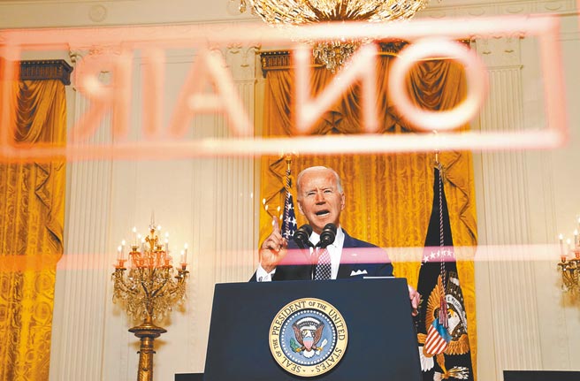 美国总统拜登19日在白宫透过视讯方式，向慕尼黑安全会议发表演说。（路透）