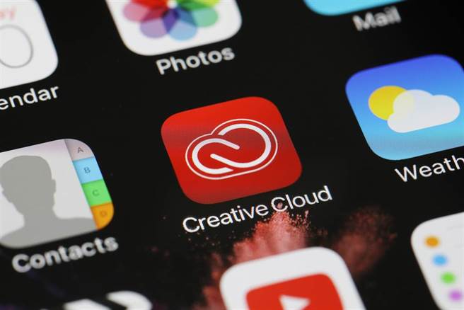 Adobe 推出檔案共同作业功能。(达志影像／Shutterstock提供)