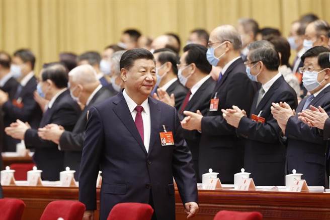 中國大陸將今年經濟成長率定在「6%以上」，專家說，這個目標低於外界普遍預期的8% 至9%的幅度，相信是為銜接未來幾年的發展情況而訂出。（圖／新華社）