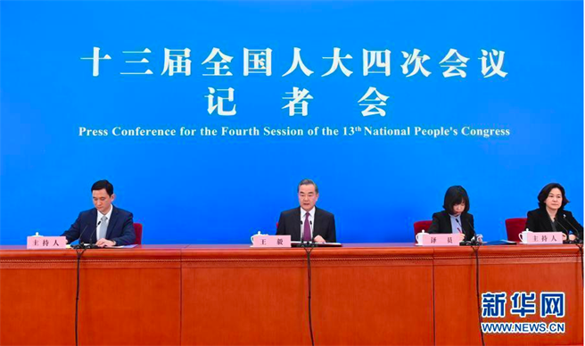 大陆国务委员兼外交部长王毅就「中国外交政策和对外关系」相关问题回答中外记者提问。（新华社）