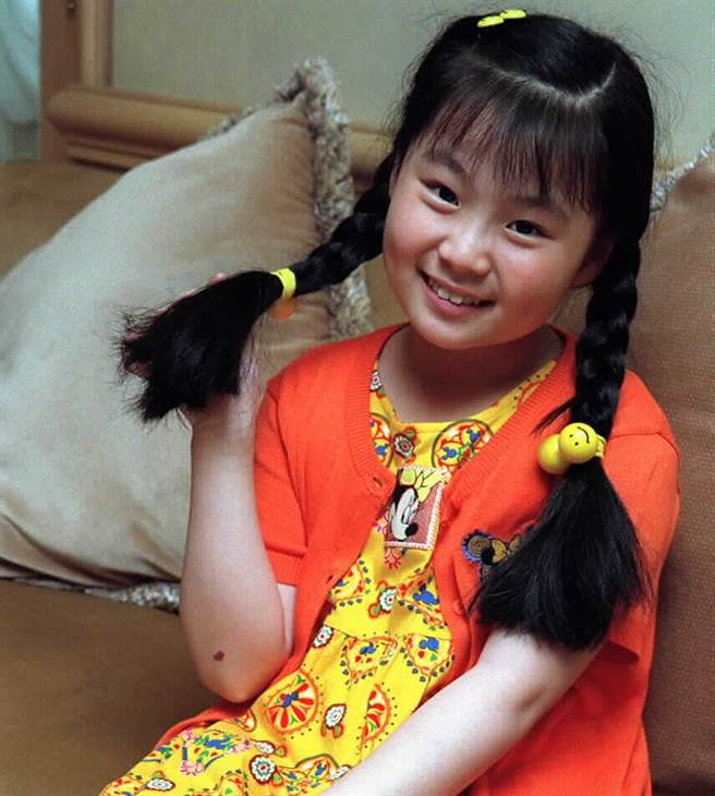 楊小黎小時候肉嘟嘟的模樣，可愛又討喜。(本報系資料照)
