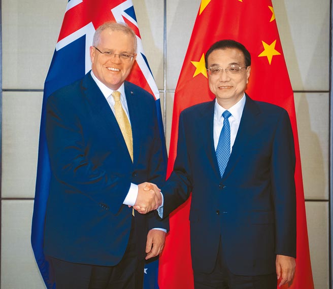 中國宣布暫停中澳戰略經濟對話機制下一切活動。圖為2019年，中國國務院總理李克強與澳洲總理莫里森舉行第七輪中澳總理年度會晤。（新華社）