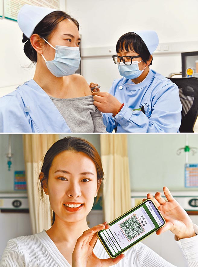 中疾控主任高福近日指出，预计到明年中国将有9亿人至10亿人接种新冠疫苗，可达到实现全民免疫的标准，图为医护人员接种新冠疫苗。（新华社）