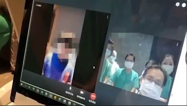 检疫中心医护人员替9岁小男童惊喜庆生，他开心许愿「全家都可以平平安安的回家」，鼓舞全体同仁。（图／台北慈济医院提供）