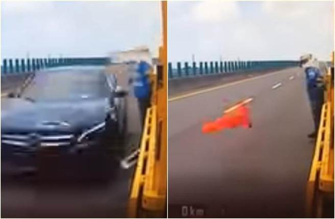 黑色宾士贴着工人的肚子刷过，三角锥被撞到弹飞。（截自脸书社团《●【爆废公社二馆】●》影片）