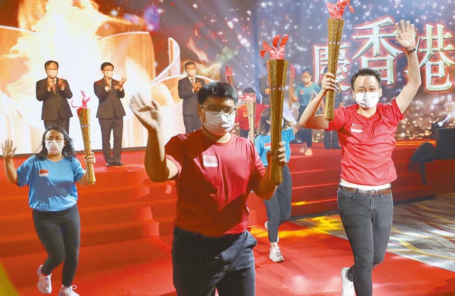 大陆全国港澳研究会副会长刘兆佳认为，《香港国安法》实施后，代表北京不再寄望香港「一国两制」对台湾示范作用。图为香港于1日举行「薪火相传」接力跑活动。（新华社）