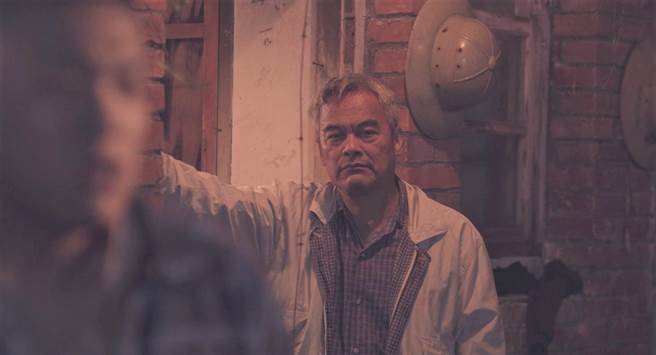 林庆台牧师在山盟MV饰演伐木工。（拍谢少年提供）