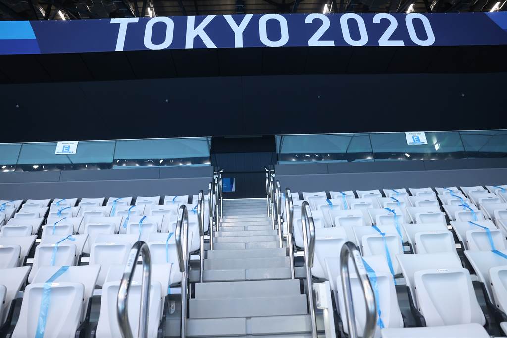 日本东京确诊人数攀升，为了防堵病毒在奥运扩散，2020东京奥运不开放观众採闭门比赛。27日在东京水上运动中心举办的游泳赛事，因无观众，现场空荡荡。（中央社）(photo:ChinaTimes)