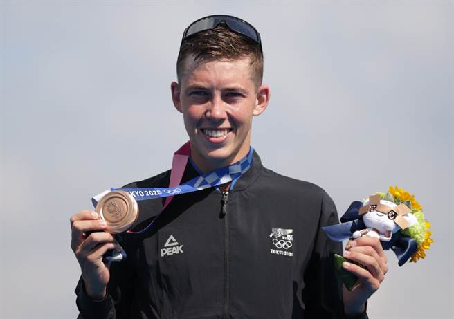 纽西兰铁人三项好手海登伍德获得铜牌，没想到前女友静候着脸皮想要復合。(路透／资料照)