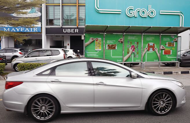 叫車服務巨擘Grab與收購公司SPAC合併公開上市。圖／路透