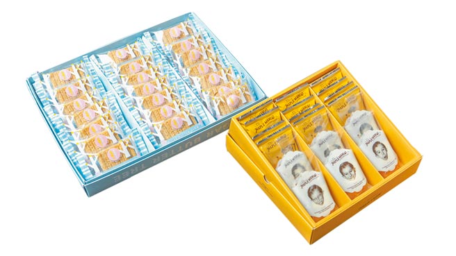 新光三越引进首度登台的日本人气伴手礼，Maple mania经典礼盒（右）950元，限量500盒；SUGAR BUTTER SAND TREE白巧克力夹心脆饼礼盒（左）810元，限量1000盒。（吴松翰摄）