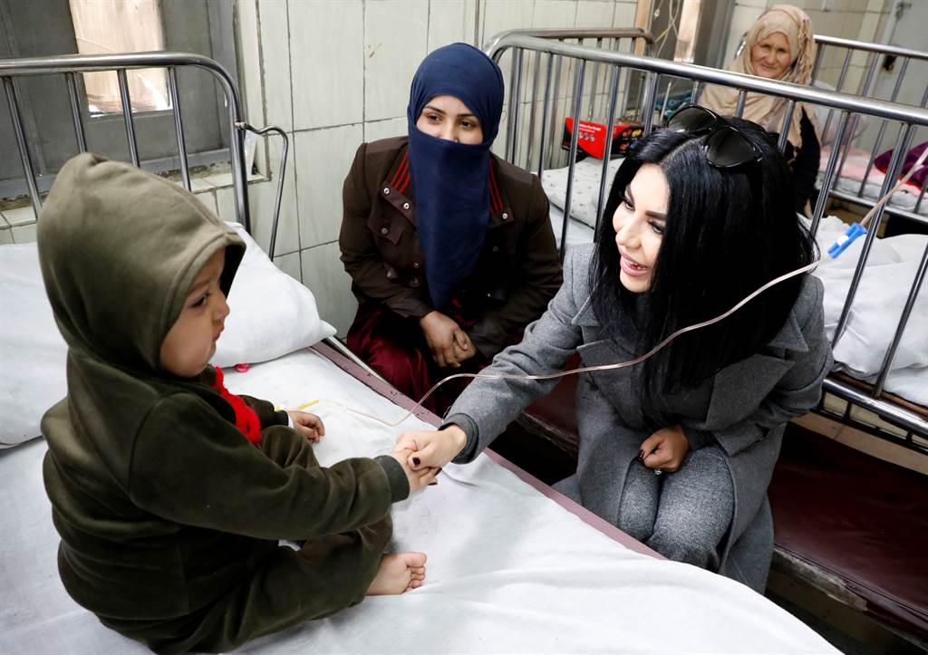 图为塞伊德于2019年探访喀布尔医院的孩童。图/路透社(photo:ChinaTimes)