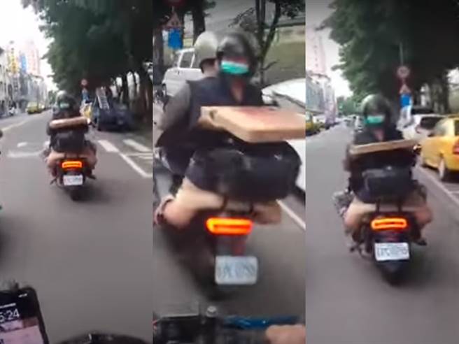 高雄1名机车骑士日前遭直击，疑似为了方便边骑车边拿着比萨，竟与后座女乘客「背对背」，由女乘客面朝后方、拿着比萨盒搭乘。（翻摄自Youtube频道「Wowtchout-地图型行车影像分享平台」）