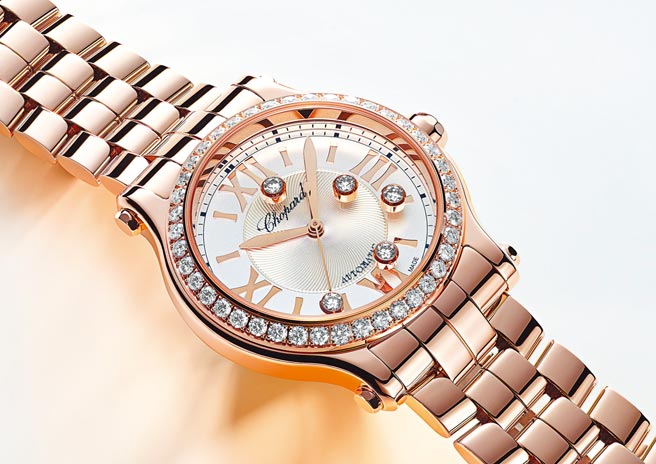 萧邦Happy Sport 33 mm玫瑰金表款，表圈镶钻、18K金表炼。