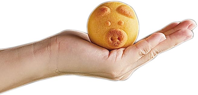 〈点点心〉的〈黄金猪仔礼饼〉，猪仔造型五官立体浑圆，萌呆表情十分逗趣。图／业者提供