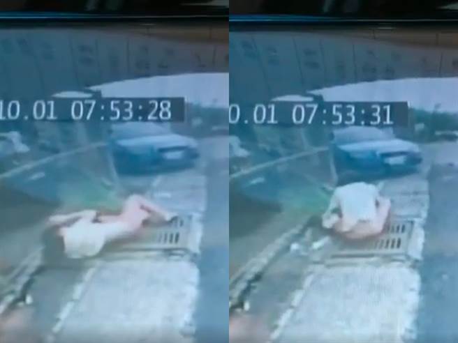 1辆轿车失控翻覆后四脚朝天，不断旋转打滑拖行，车身旋转时竟当场抛飞1名车内女乘客，女乘客疑似从车窗遭甩出车外，整个人掉到路边，再缓缓坐起。（翻摄自脸书「重机车友❘各区路况、天气回报中心」）