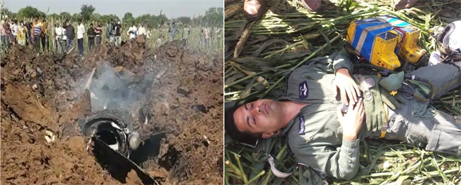 印度空軍幻象2000墜機在田野，飛行員跳傘後躺下休息。(圖/NDTV)