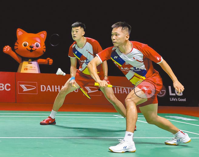 李洋（右）與王齊麟在印尼公開賽不敵大馬組合，無緣男雙8強。（badminton photo提供／資料照）