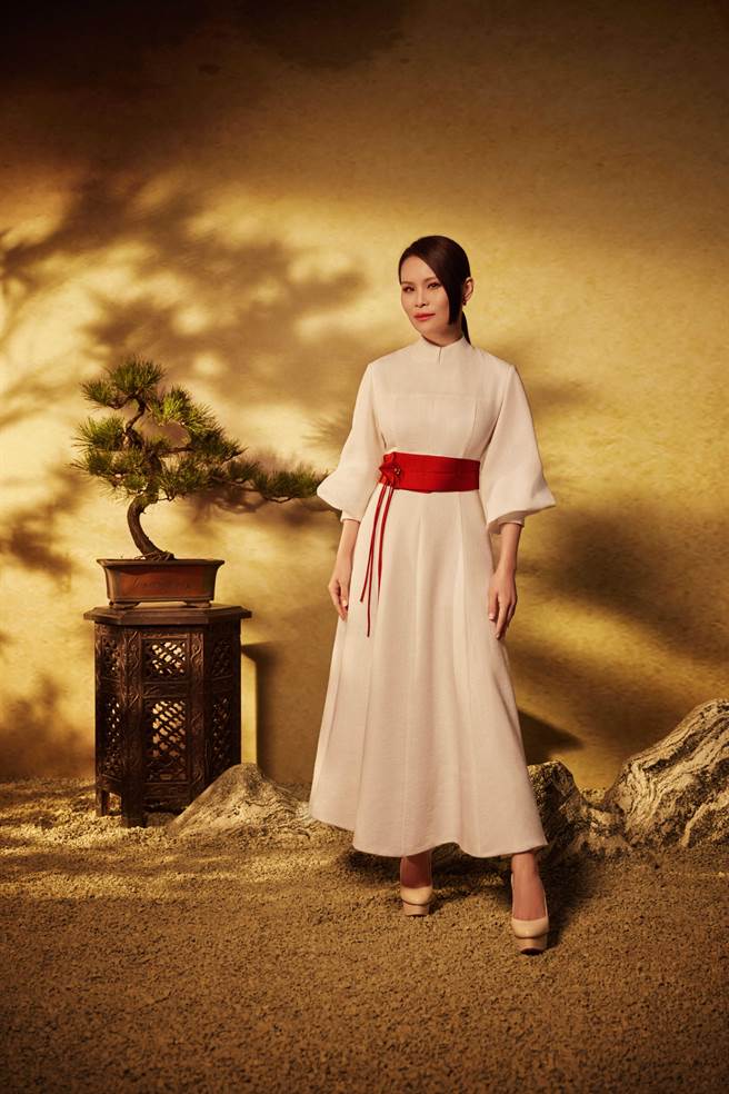 周蕙也被丁噹诠释〈约定〉感动。（相信音乐提供）