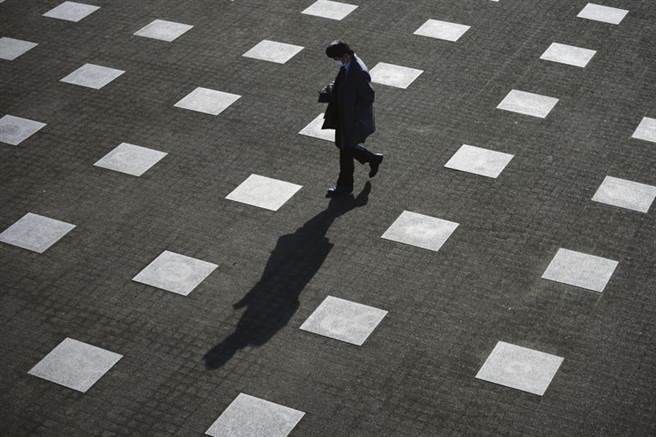 东京都确认一例在自家隔离时发病的Omicron病例，是首例非机场检疫掌握的病例。图为东京街头。（图／美联社）