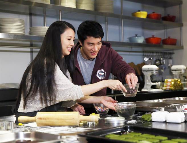 图为2014年王力宏与李靓蕾合影画面。（资料照/张佑铭摄）