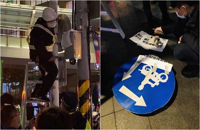 待转大富翁成员拆两段式左转号志牌，1人还对警比中指，警逮3人。(合成照)
