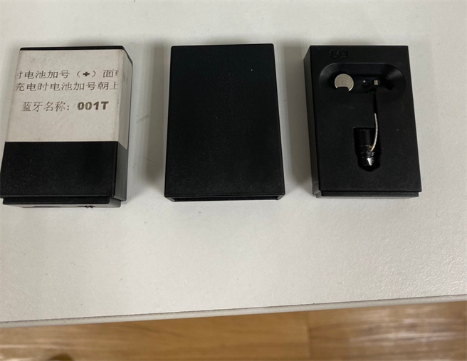 集團使用特殊藍芽耳機，考試現場播放答案給舞弊考生。（高雄地檢署提供／袁庭堯高雄傳真）