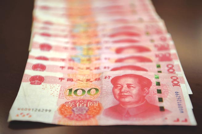 人民币兑美元在岸价收盘价大涨逾160个基本点。图／中新社