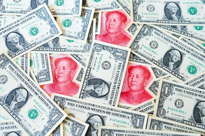 在岸、离岸人民币对美元18日一度双双升破6.34，均创2018年5月来新高。（中新社）