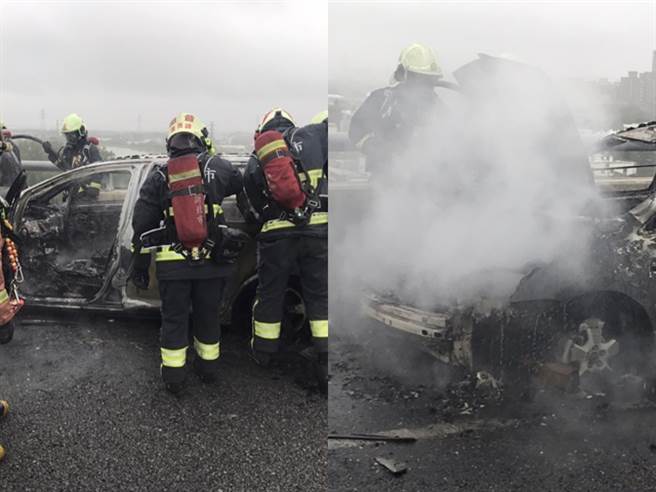 国道1号高架南向50.3公里处今（2）下午1时55分发现自小客车因不明原因自燃，整辆车停在路肩冒出浓烟。(翻摄照片)