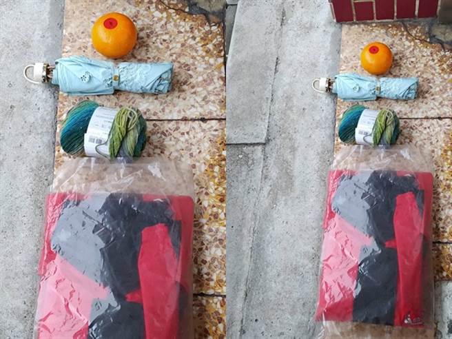 网友发现住家门口被不明人士放了4样物品，分别是橘子、雨伞、毛巾与衣物，询问有什么含意；有内行网友看出应该是谐音「橘伞褥衣=吉祥如意」。（翻摄自脸书「爆废公社」）