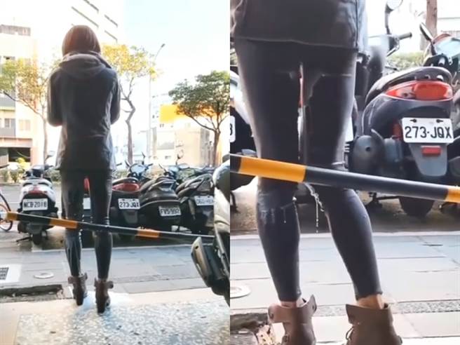 1名女子站在骑楼边，下体处竟开始不断流出「白色液体」沾湿整件黑裤子，甚至滴下水滴，而女子竟浑然不知，整件裤子被沾湿到呈现「黑白相间」。（翻摄自脸书「爆废公社二馆」）