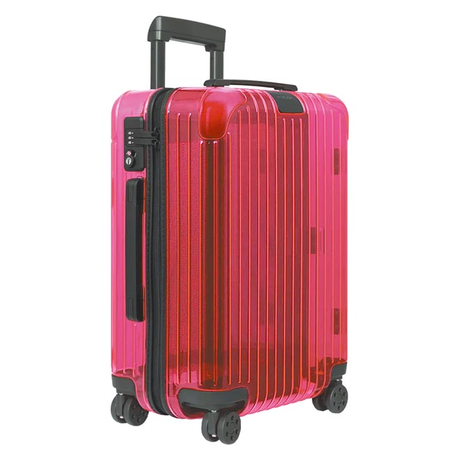 微风精品线上Rimowa Essential Neon Cabin 21吋登机箱，霓虹粉，优惠价2万6900元。（微风提供）