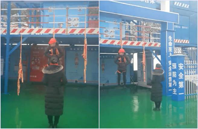 大陆湖南长沙一名工人在工地不绑安全带，妻子将他「吊空中训话」，希望丈夫及所有工人都能将安全放在心上。（翻摄搜狐网）