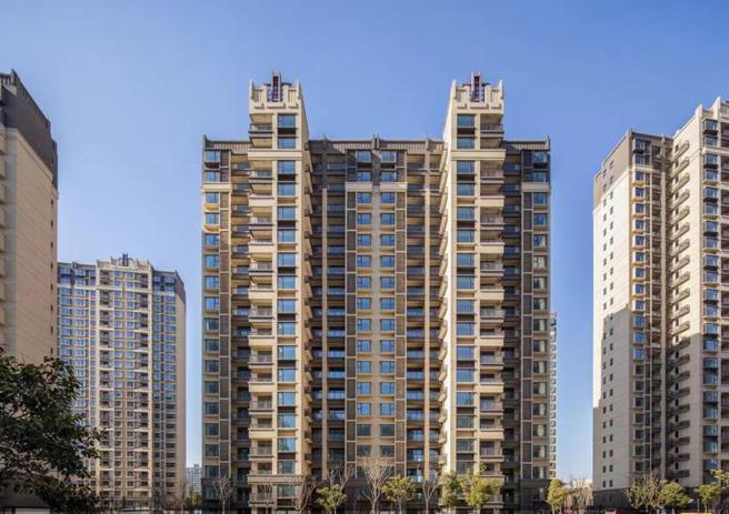 （鼎固上海嘉定大型复合式住商造镇中住宅建案「匯景华庭三期」完工交屋，使得2月营收大暴衝。图／鼎固提供）