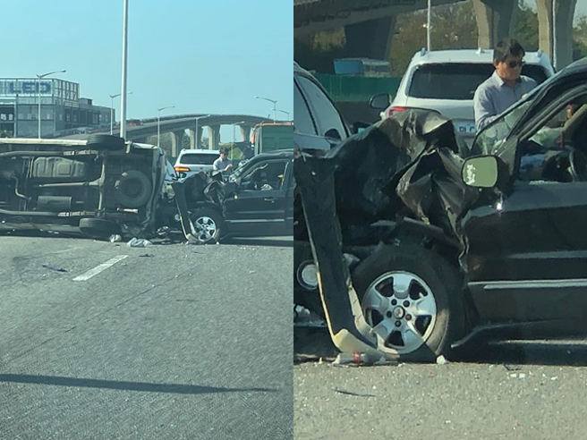 國道2號大園交流道今（11日）下午3時許發生3車追撞，其中1輛車當場90度側翻躺在路中，另輛車車頭幾乎撞爛。（翻攝自桃園市議員游吾和臉書）