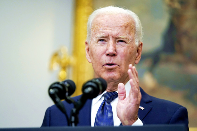 美国总统拜登签署2022财政年度支出法案生效，法案包含禁止美国行政部门花钱制作、採购或展示任何「不正确标示」台湾领土的地图。（资料照／美联社）